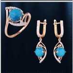 Set with turquoise. Red gold