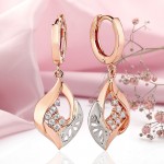 Boucles d'oreilles or rose pendantes zircon