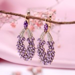 Yellow gold earrings with diamonds and amethyst