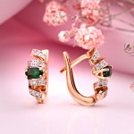 Gold earrings with diamonds and emerald