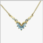 Collier en or avec topaze et diamants