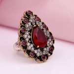 Silver ring with ruby ​​and zirconia