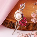 Brosche hecho de plata 925 con oro, perla circonia alpanita