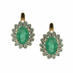 Golden earrings with emeralds