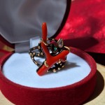 Gold-plated silver ring with coral and zirconia