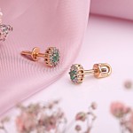 Rose gold stud earrings. Diamonds and emerald