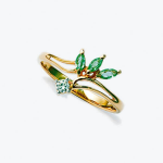 Gold ring with emeralds and diamond