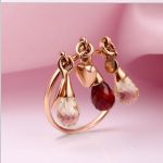 Bague en or "Joie". Citrine, grenat