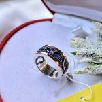 Anello in argento con oro, zirconi, alpanite