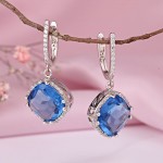 Silver earrings with topaz and zirconia