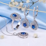 White gold set with diamonds and sapphire