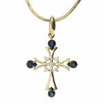 Pendentif croix dorée avec saphirs et diamants