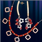 Кольцо и серьги из красного золота 585 пробы с кораллом.