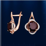 Серьги из красного/белого золота и граната.