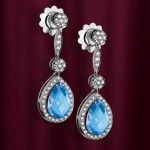 White gold earrings with diamonds and topaz