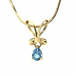 Golden pendant with topaz