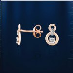 Goldene Ohrstecker. Diamanten
