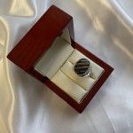 Men's ring made of blackened silver with onyx and tiger's eye