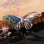 Spilla in argento "Farfalla". Zirconia e alpanite