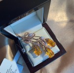 Gold-plated silver brooch with amber roses
