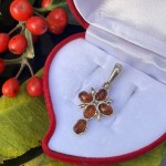 Silver cross pendant with amber