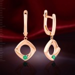 Earrings with emerald