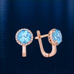 Earrings with topaz & fianites. Red gold
