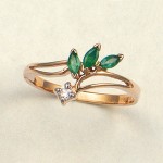 Gold ring with diamonds, emeralds