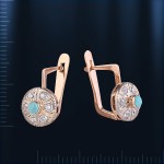 Earrings with turquoise. Bicolor