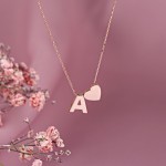 Golden necklace "A" with heart