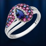 Gold ring with sapphire & rubies