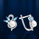 Earrings with pearls & topazes. White gold