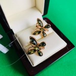 Boucles d'oreilles "Papillons" en argent plaqué or. Ambre vert