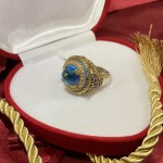 Gold-plated silver ring with topaz and zirconia