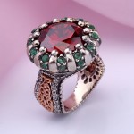 Silver ring garnet and emerald