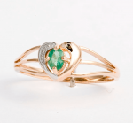 Golden ring with emerald