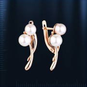 Boucles d'oreilles en or rose avec perles