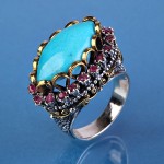 Ring with turquoise & rubies. Silver
