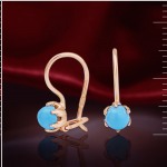 Earrings with turquoise. Red gold