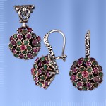Silver set with rubies and emeralds