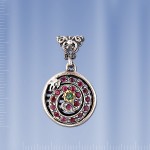 Pendant with emerald and rubies