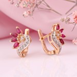 Pendientes de oro rosa con rubíes y diamantes.