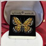 Fermall de bijouteria "Papallona". Zirconia i òpal
