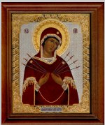 Икона Семистрельная Богородица желтого цвета.