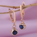 Earrings with spinel. Red gold