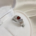 Silver ring “Captivity of Beauty”. Garnet and cubic zirconia