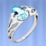 Silver ring with topaz & fianites